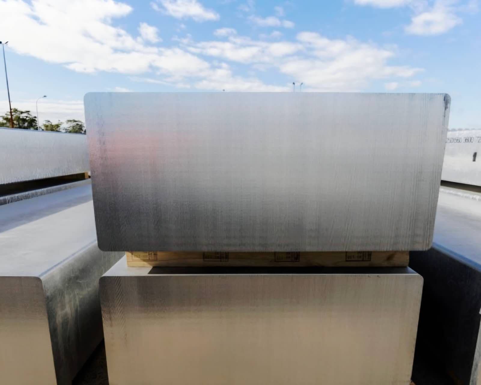 Stacked aluminum block billets on pallets